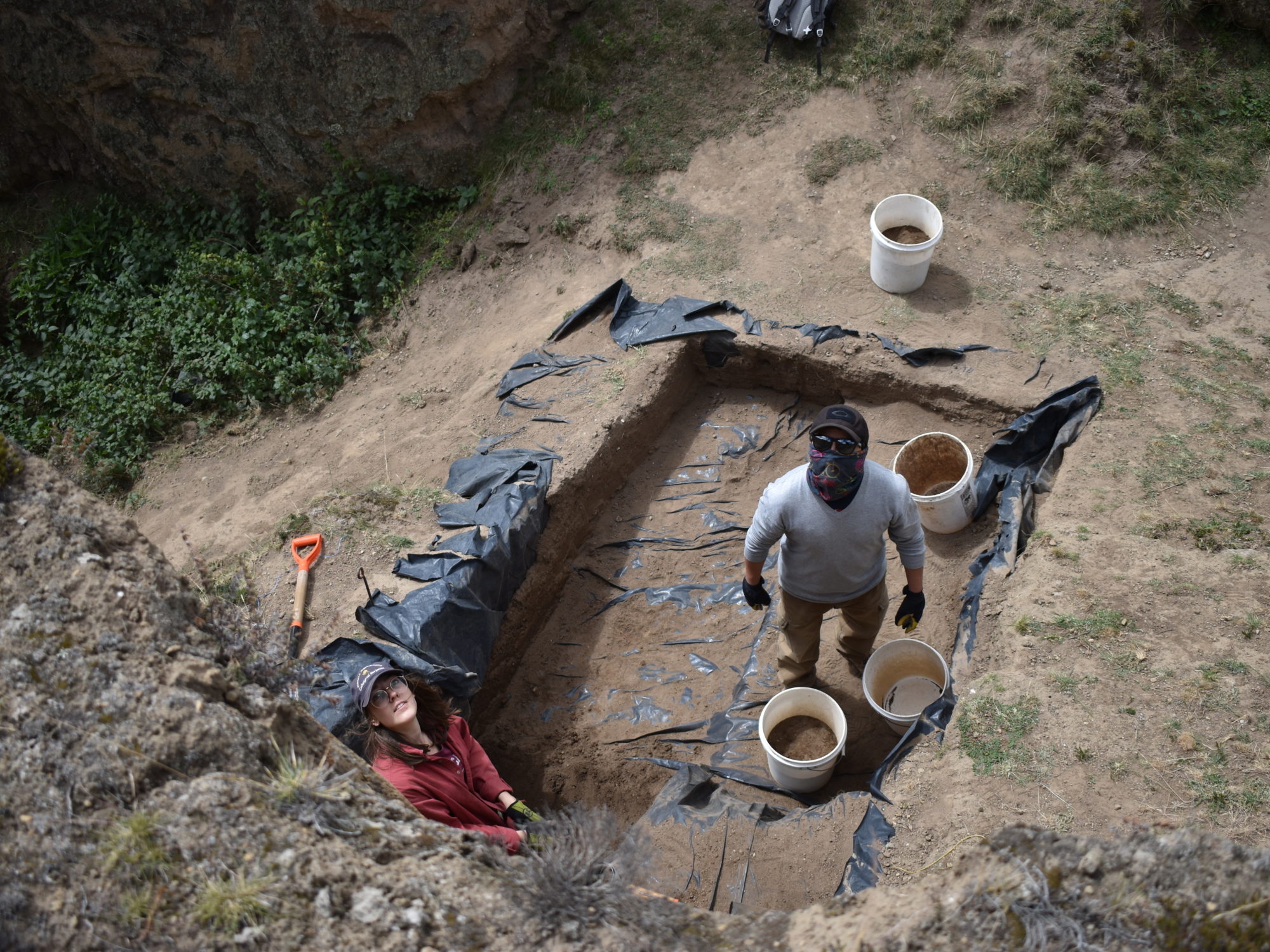 Byron and Clementine remove backfill from a 2018 excavation that was continued in 2019 - Parque Arqueológico Cochasquí