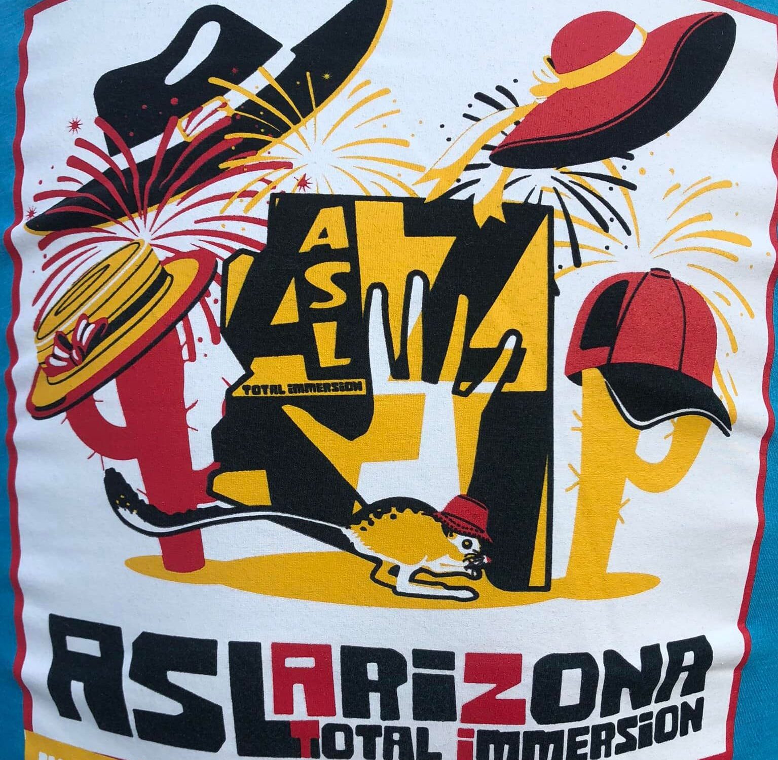 Back of the shirt– white rectangle against blue backgroud. Inside the rectangle are designs of a cowboy hat, cap, sun hat, a open-palm hand, a kangaroo, and text "ASL Arizona Total Immersion 2022". Theme colors are yellow, red and black.